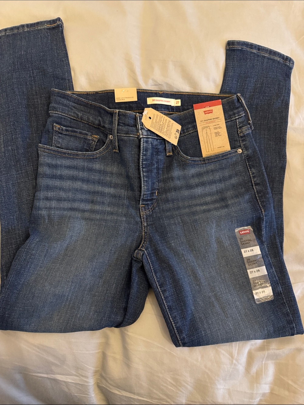 Levi's Women's Medium Blue Skinny Jeans with Faded Whiskering